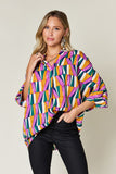 Double Take Full Size Geometric Notched Raglan Sleeve Blouse